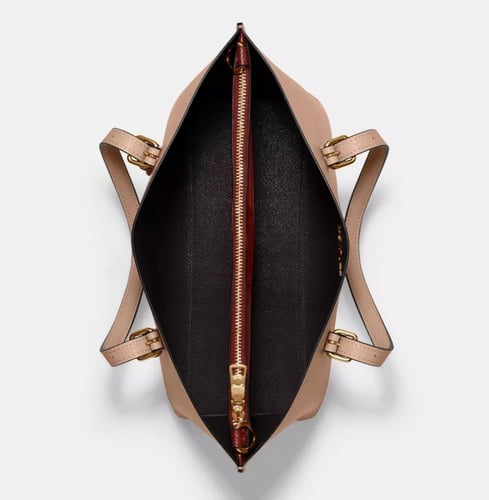 شنطة كوتش مولي وسط