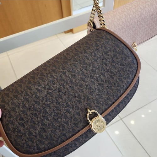 شنطة مايكل كورس ميلا وسط