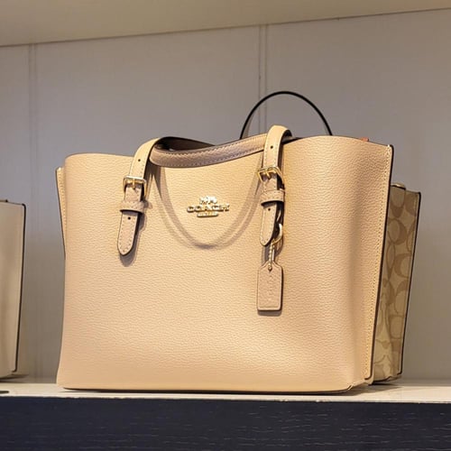 شنطة كوتش مولي وسط