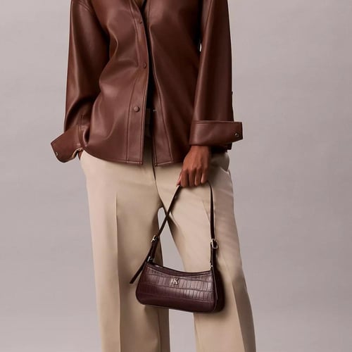 شنطة كتف كالفن كلاين لون برغندي