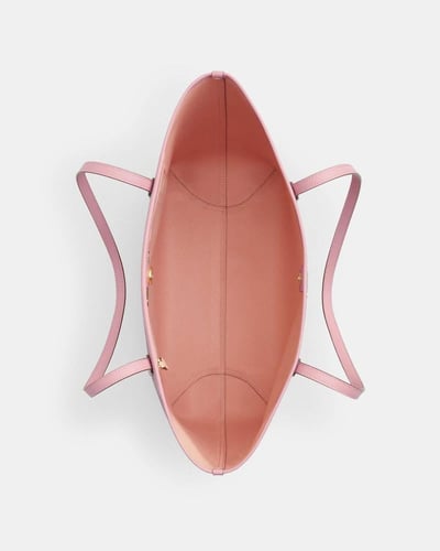 شنطة كوتش كبيره لون مميز