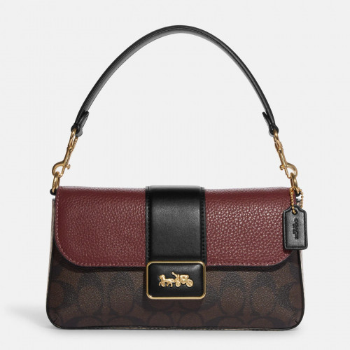 حقيبة كوتش الجديدة جريس ميني قماش مميز