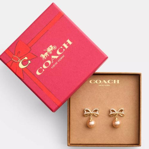 أقراط كوتش على شكل فيونكه من اللؤلؤ