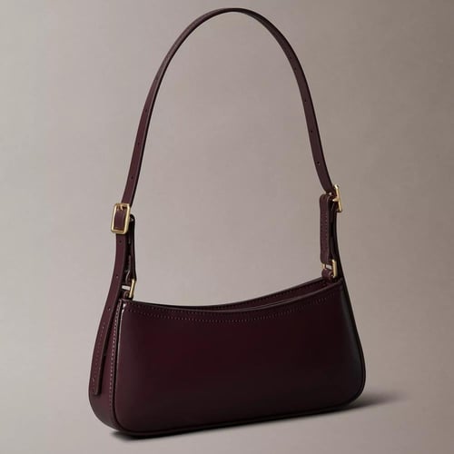 شنطة كتف كالفن كلاين لون برغندي