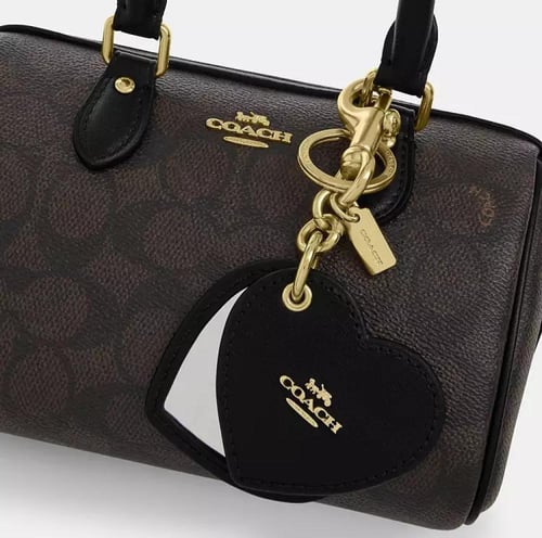 شنطة كوتش روان كروسبودي مع ميدالية مرآة