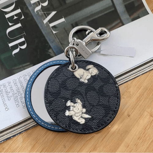 ميدالية كوتش و مرآة