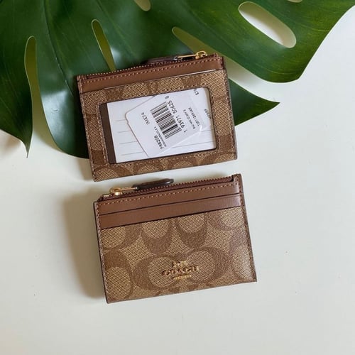 محفظة بطاقات كوتش صغيرة نحيفة في قماش التوقيع