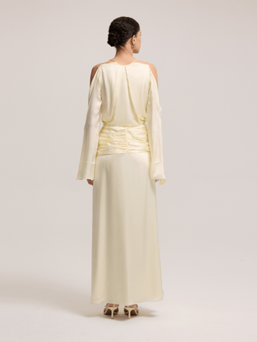 فستان سهرة أصفر فاتح بكسرات خصر أنيقة - لإطلالة مت...