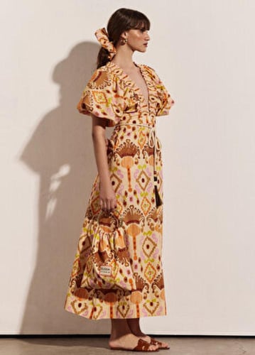 فستان برتقالي منقوش على شكل حرف V من Savio