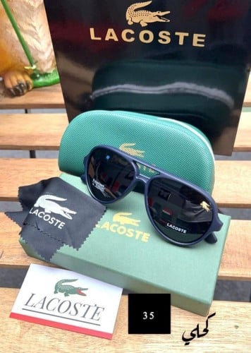 نظارة شمسية لاكوست رجالية - تصميم رياضي فاخر بلون...