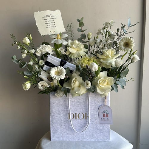 عطر ديور هوم 50 مل || مع تنسيق ورود في كيس ديور