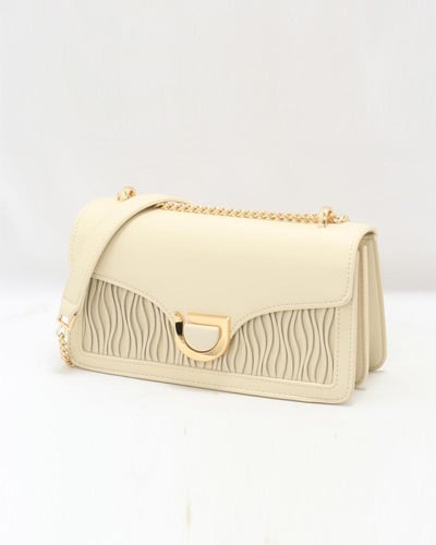 شنطة نسائية بلون بيج