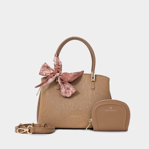 شنطة نسائية صغيرة مع فيونكة لون بني فاتح