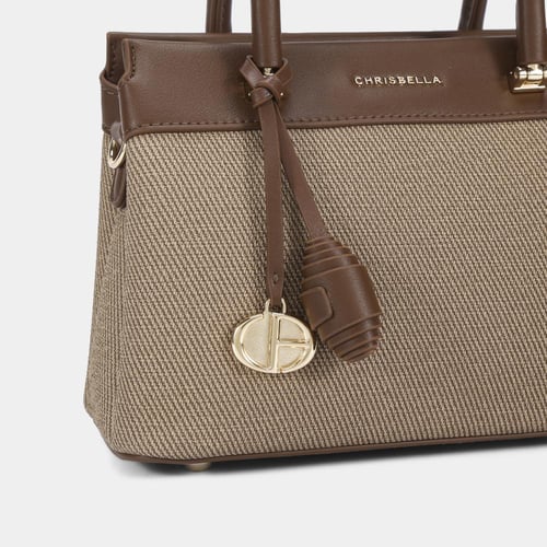 شنطة نسائية صغيرة باللون البني