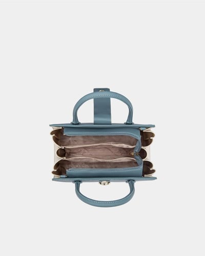 شنطة نسائية بلون اسود