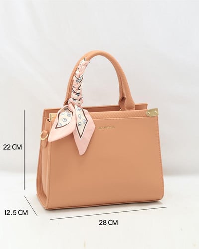 شنطة نسائية بلون زهري