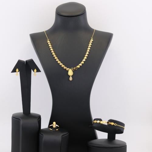 طقم ذهب خالص على شكل قطرات و ورق الشجر - عيار 21