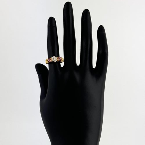 خاتم ذهب ثلاث ازهار ابيض وزهرتين بنفسجي - عيار 21