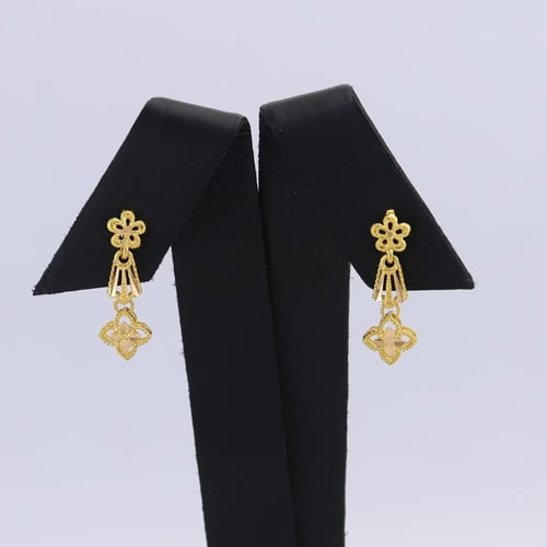 طقم ذهب هرمي مع زهرتين - عيار 21