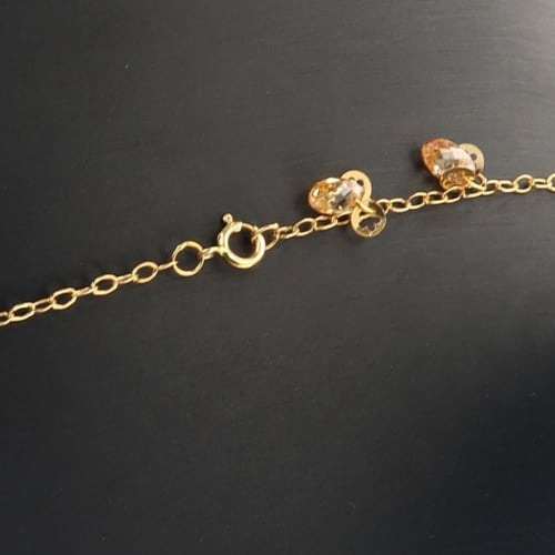 سبحة ذهب بكرات الذهب مع لون الميناء الازرق و الابي...