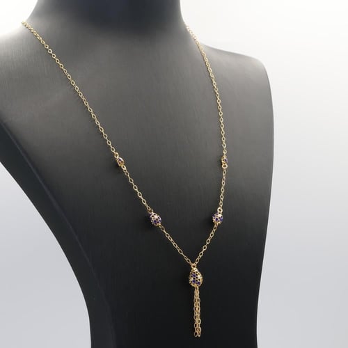 سبحة ذهب بكرات الذهب مع لون الميناء الازرق و الابي...