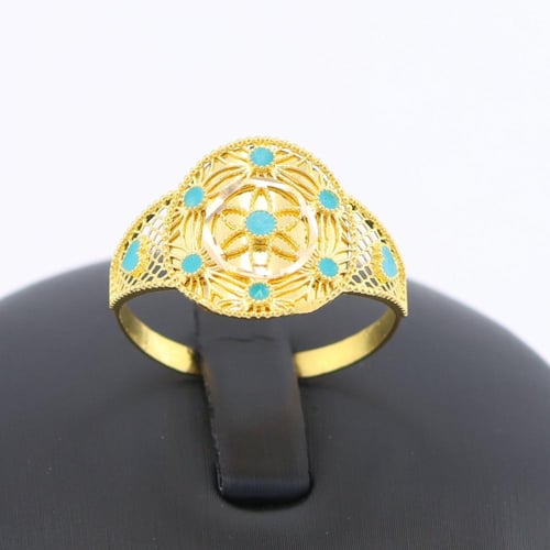 خاتم ذهب زهرة بمحيط فيروزي عيار 21