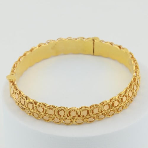 اسوارة ذهب تصميم حديث يعكس النور - عيار 21