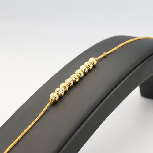 اسوارة ذهب كرات لامعه متحركة ذهب نقي - عيار 21