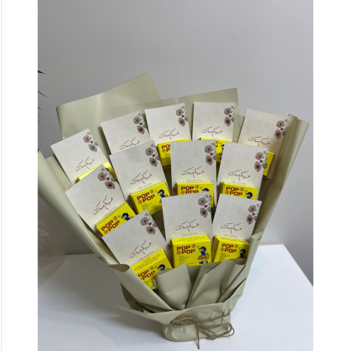 توزيعات العيد باقة تحمل 12 هدية