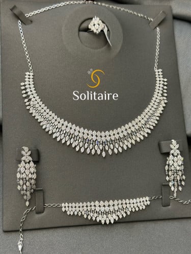 طقم تطبيق الالماس ابيض 18k