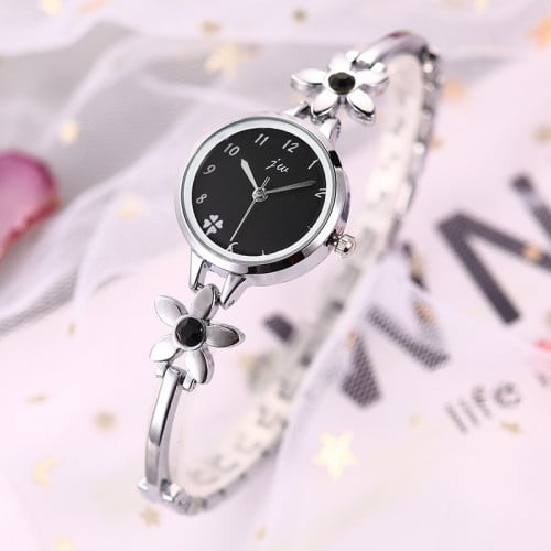 ساعة نسائية بحزام ستانلس ستيل بتصميم انيق بلون حزا...