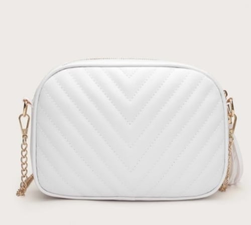 شنطة لون أبيض