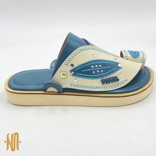 حذاء لون فيروزي مطرز صوف كتان مع زري فضي