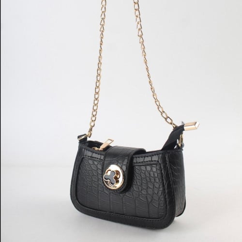 شنطة جلد بحجم مايكرو بالوان الاسود