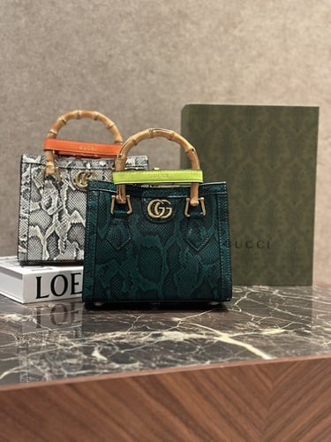 شنطة بيد خشب خيزران من قوتشي