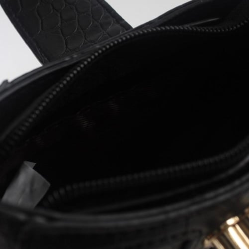 شنطة جلد بحجم مايكرو بالوان الاسود