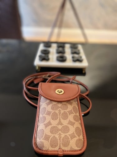 شنطة كوتش للجوال