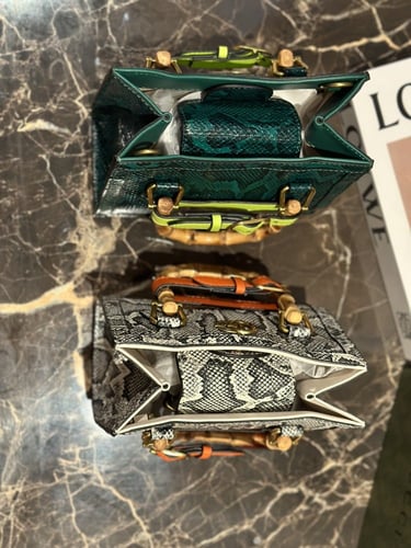 شنطة بيد خشب خيزران من قوتشي