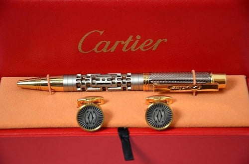 قلم وكبك ماركة كارتير ذهبي