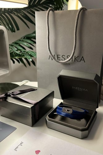 ميسيكا جلد كحلي