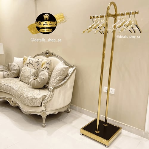 ستاند تعليق ملابس ذهبي فاخر بعجلات