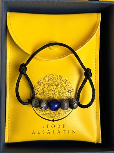 سوارة فضة مع حجر كريم عين النمر حياكة يدوية