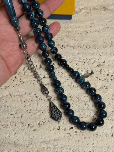 سبحة ازرق غامق مشخط رخامي بكلايت مع شكة استنلس است...