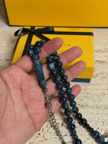 سبحة ازرق غامق مشخط رخامي بكلايت مع شكة استنلس است...