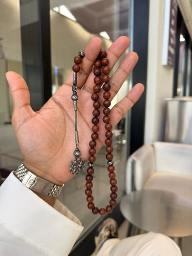 سبحة مصنوعة من حطب القرض الافريقي مع طربزونة فضة