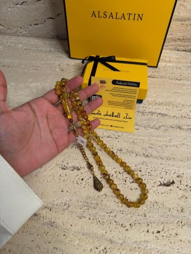 سبحه كهرمان حر شوائب مع ستيل ذهبي ونحت اسم احبك من...