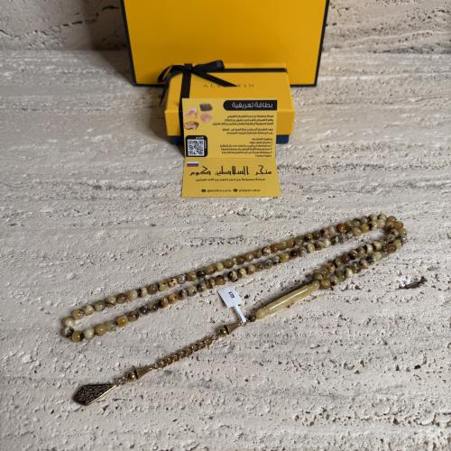 سبحه كهرمان حر شوائب طبيعية مع ستيل ذهبي