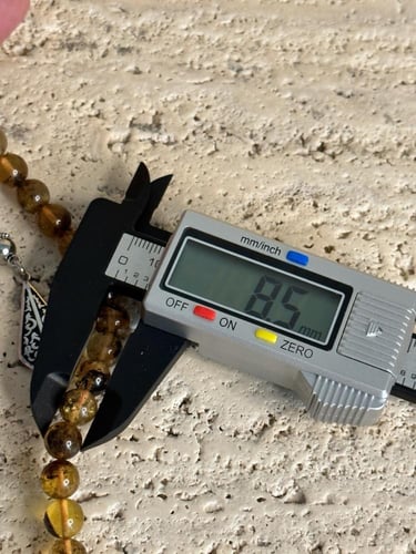 سبحة كهرمان حر شوائب طبيعية مذهب مع شكة ذهبي