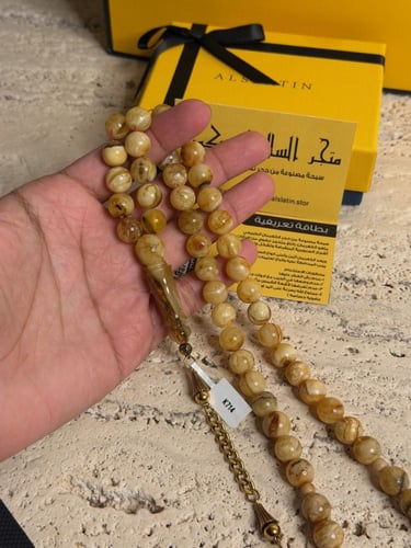 ‎سبحه كهرمان حر شوائب طبيعية مع طربزونه ستيل ذهبية