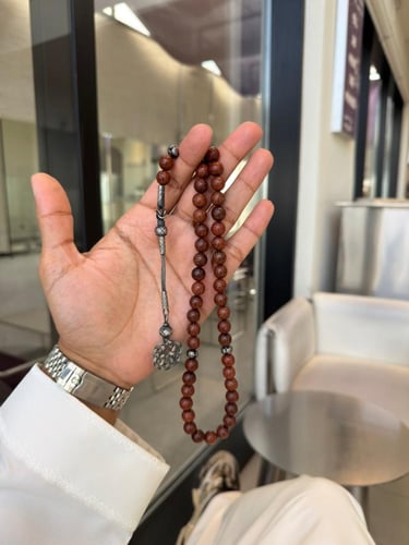 سبحة مصنوعة من حطب القرض الافريقي مع طربزونة فضة